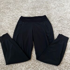 Athleta women’s joggers in black size 2 with two front zipper pockets